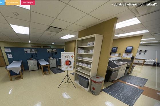 Screenshot from the Chatham Eastside virtual tour, showing the physical therapy room with raised tables and exercise space